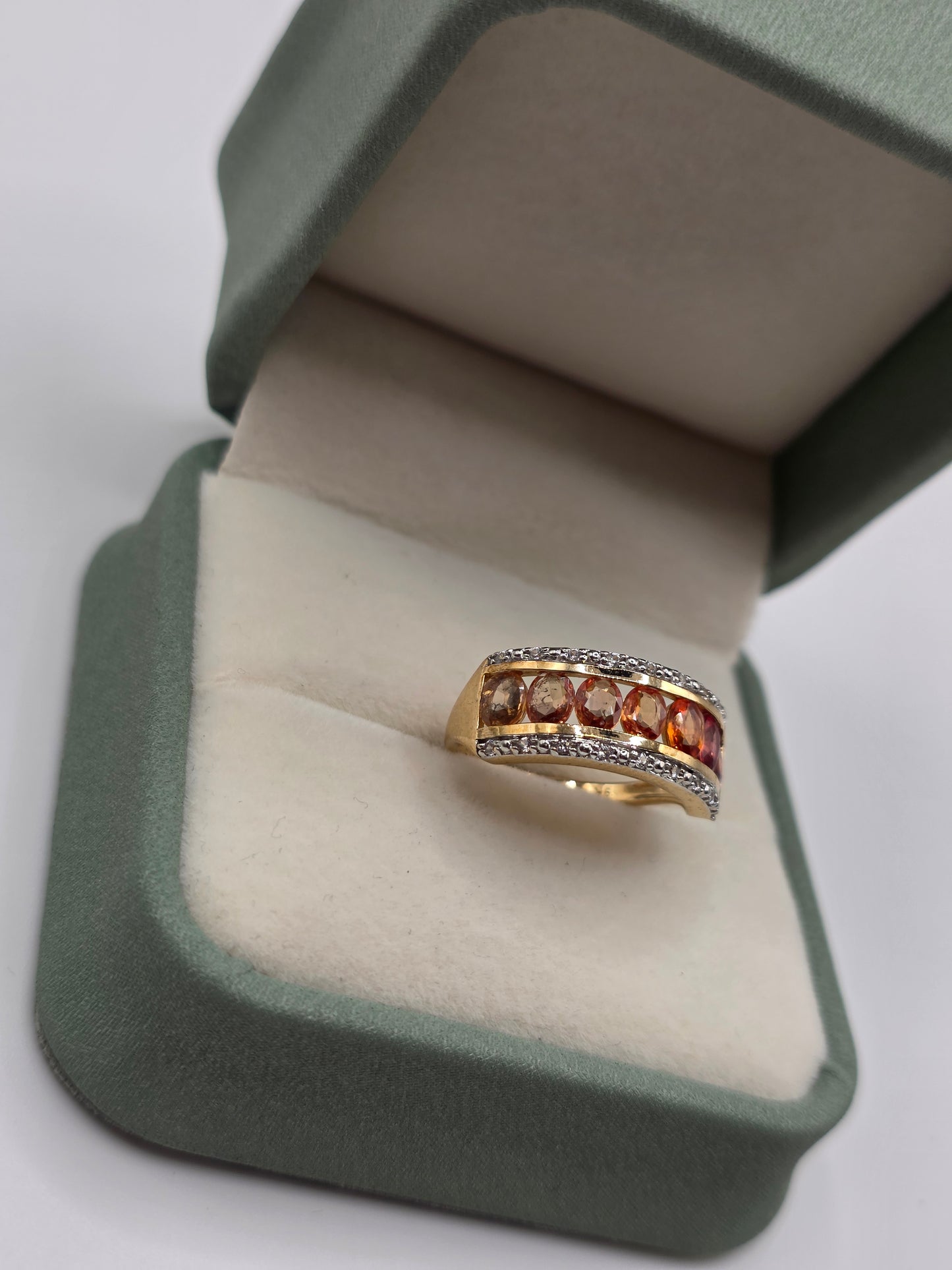 9ct gold orange sapphire and white topaz ring