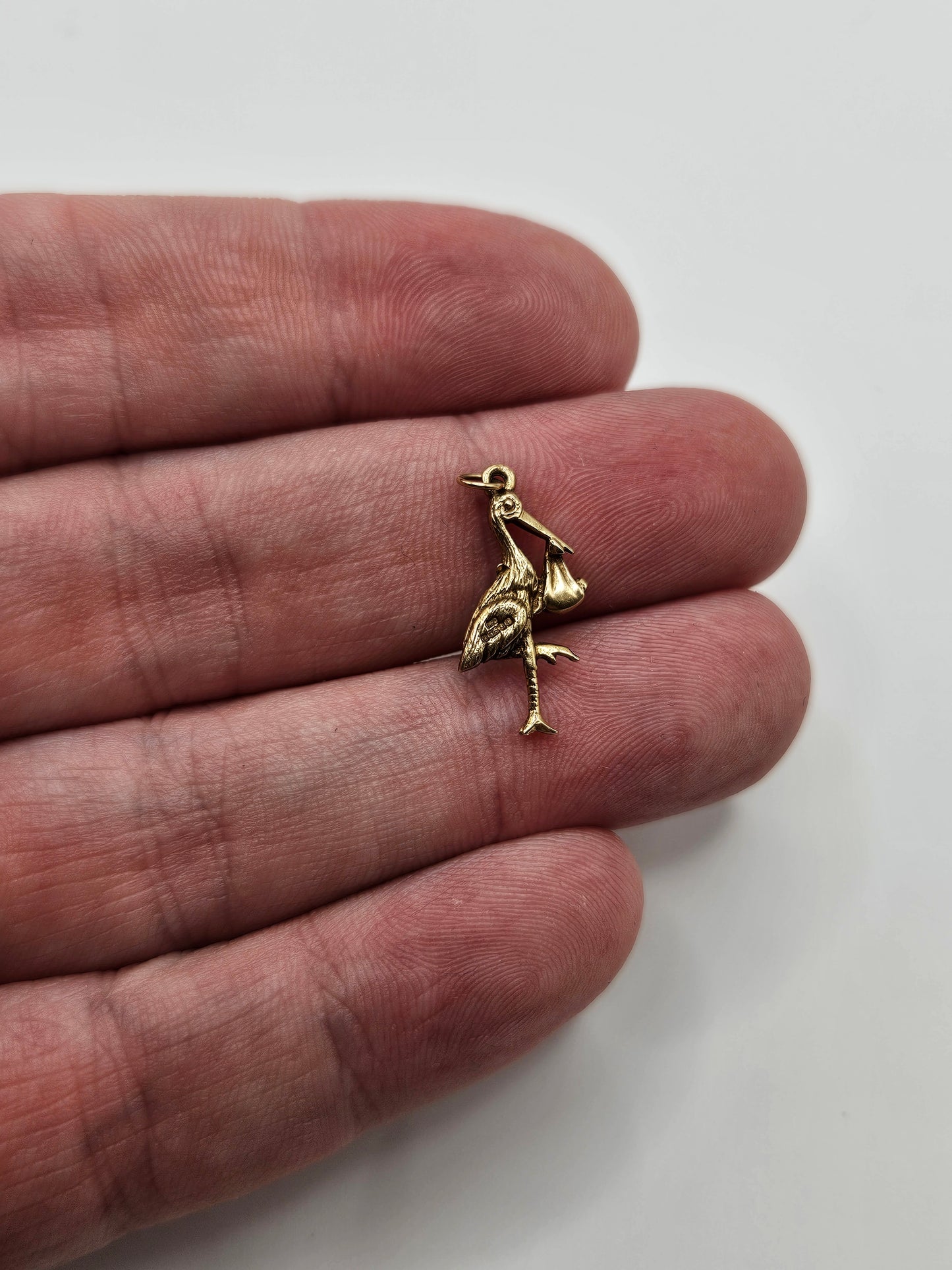 9ct gold stalk and baby charm