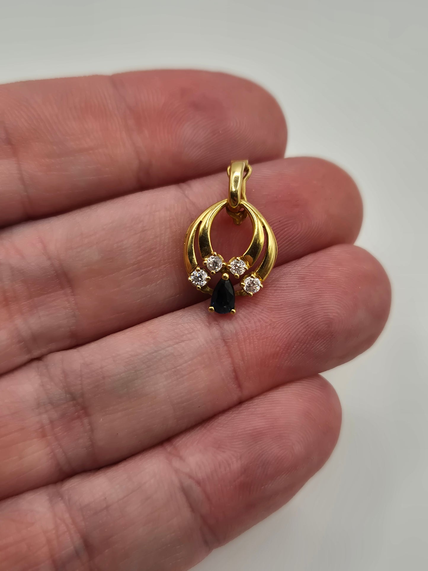 9ct gold sapphire and cz pendant