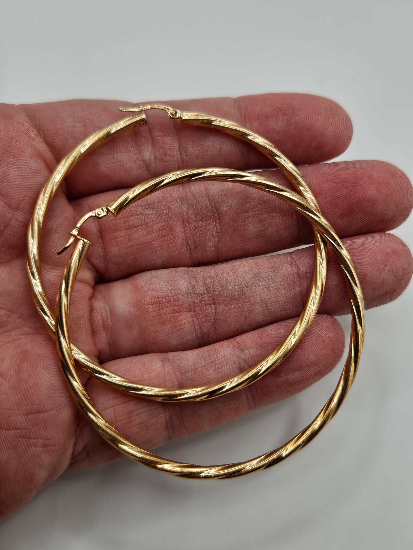 Huge 9ct gold earrings