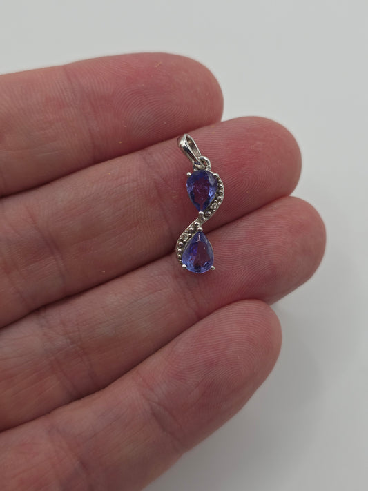 9ct white gold tanzanite and diamond pendant