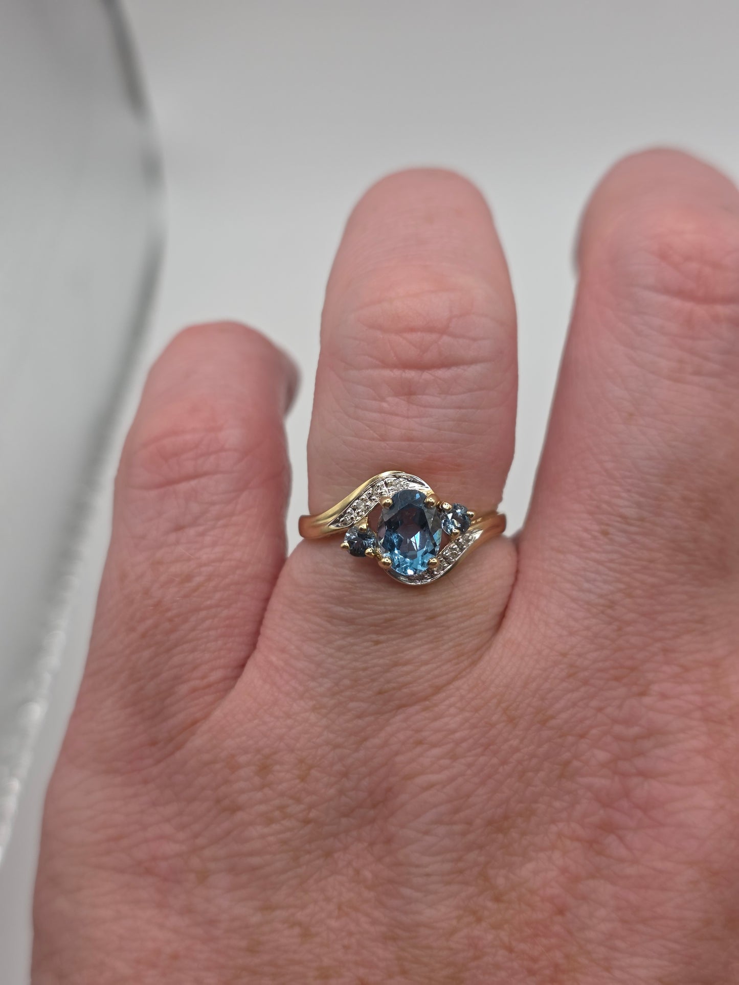 9ct gold blue topaz and diamond ring