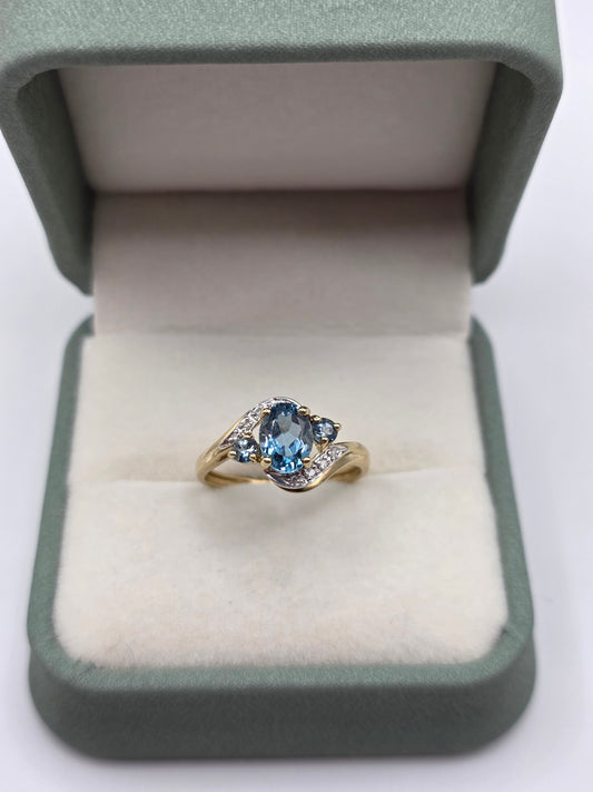 9ct gold blue topaz and diamond ring