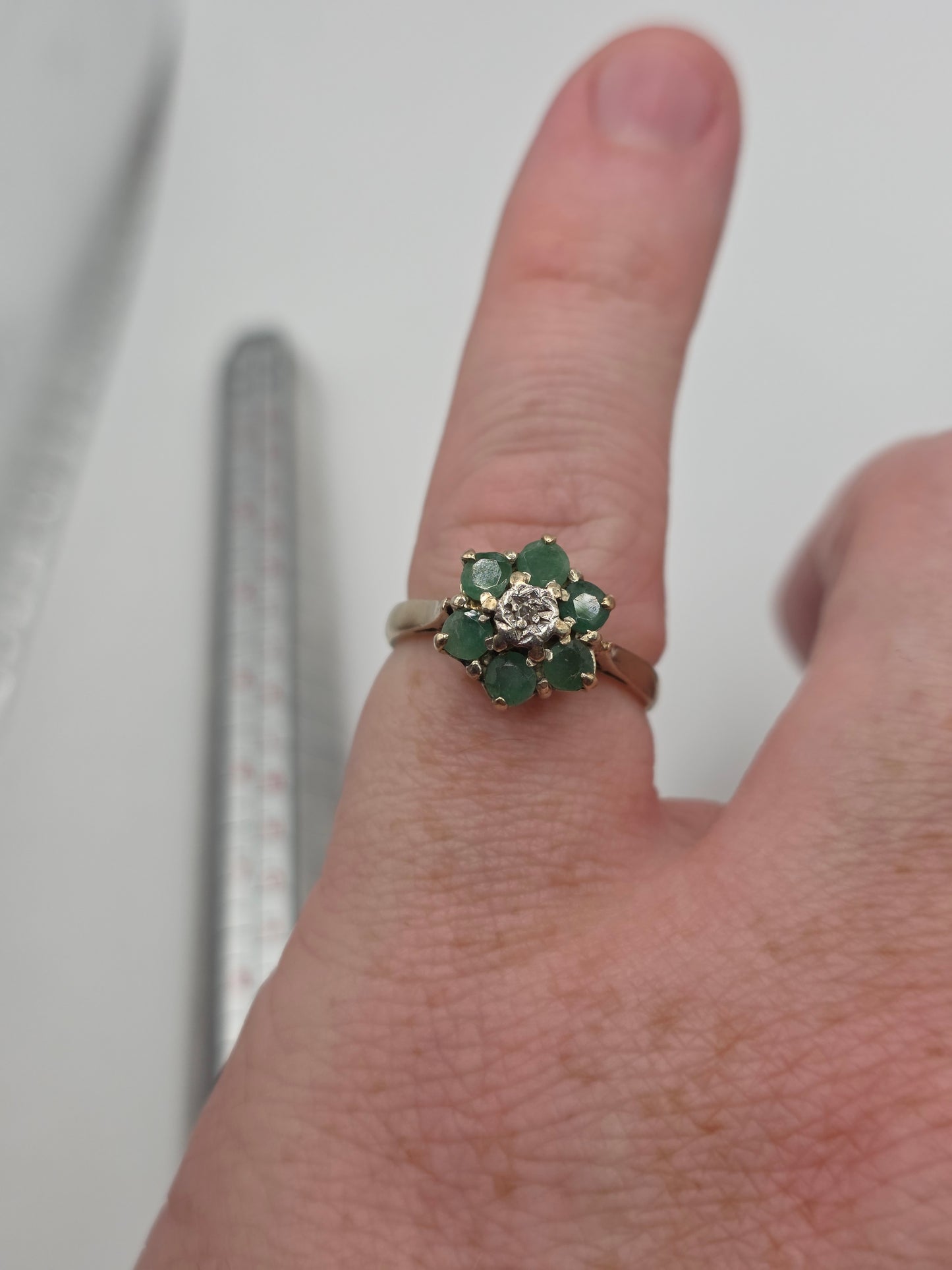 Heavy 9ct gold emerald and diamond ring