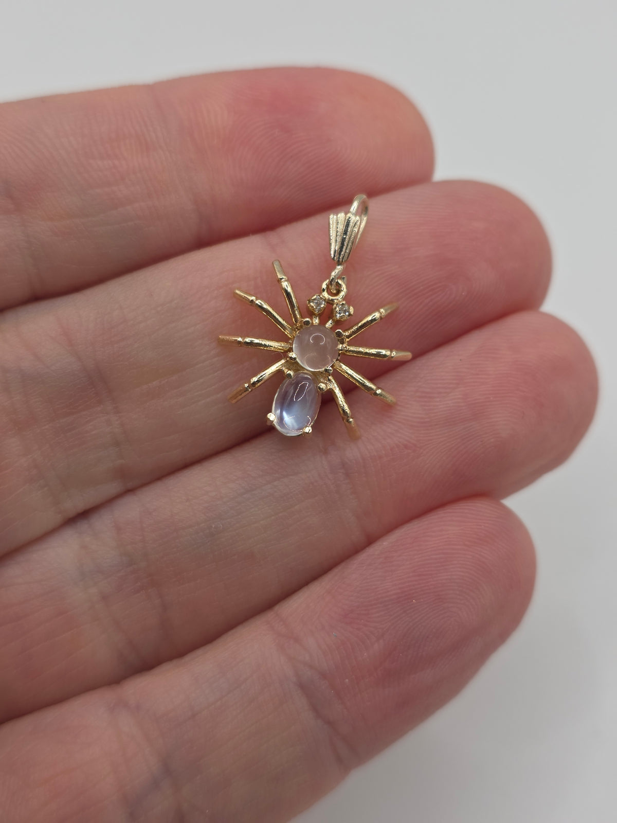 9ct gold moonstone and diamond spider pendant