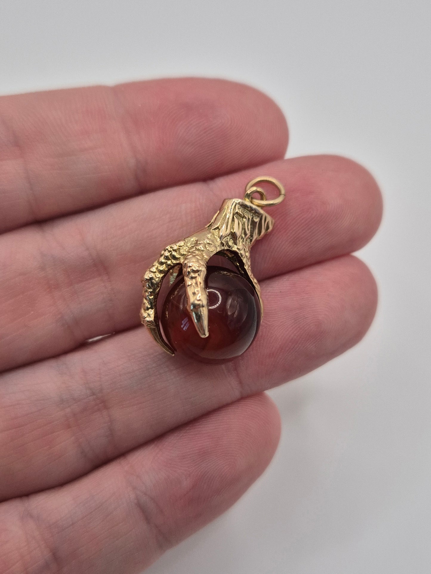 Huge 9ct gold eagle claw carnelian pendant