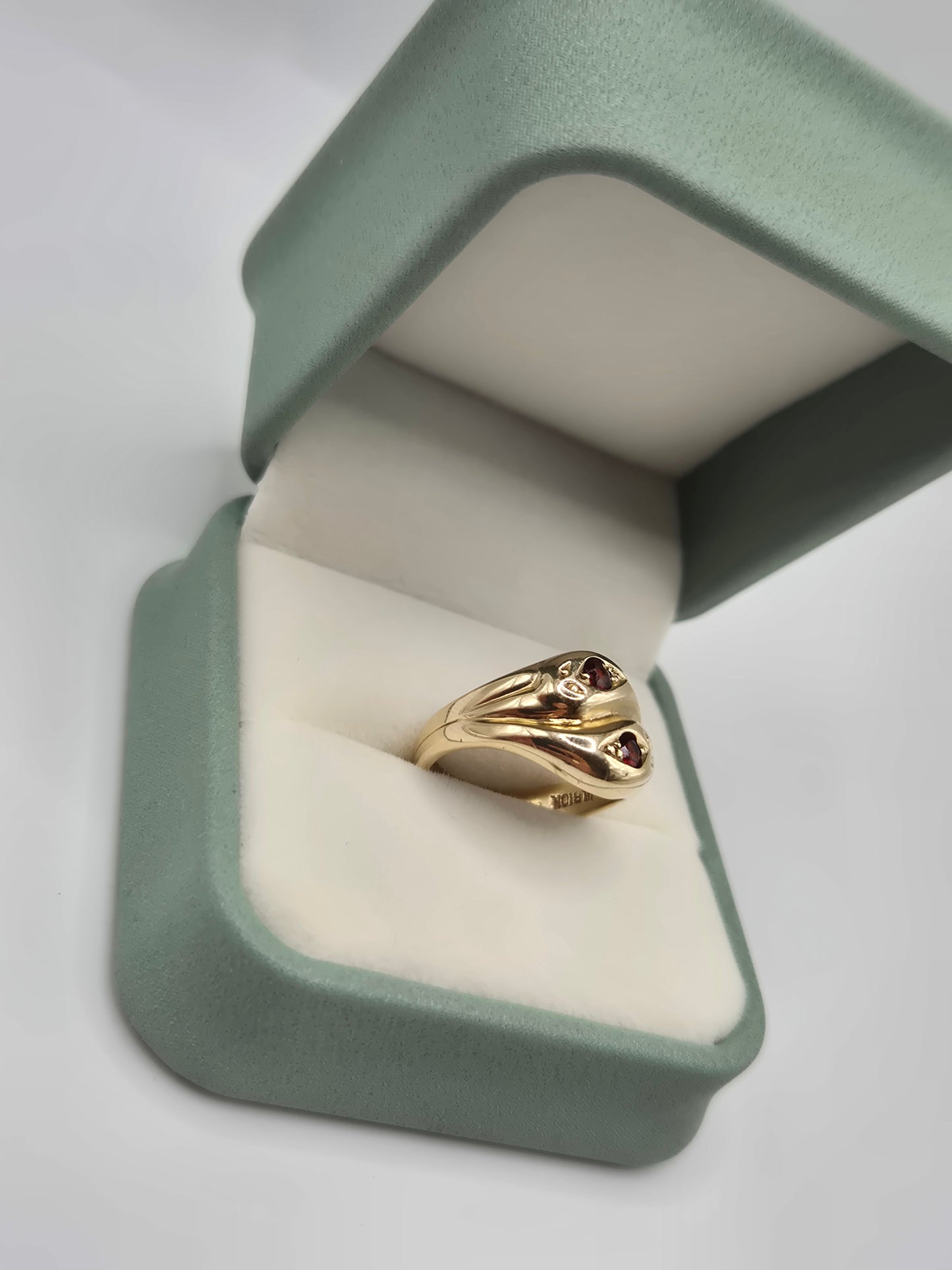 Heavy 9ct gold garnet snake ring