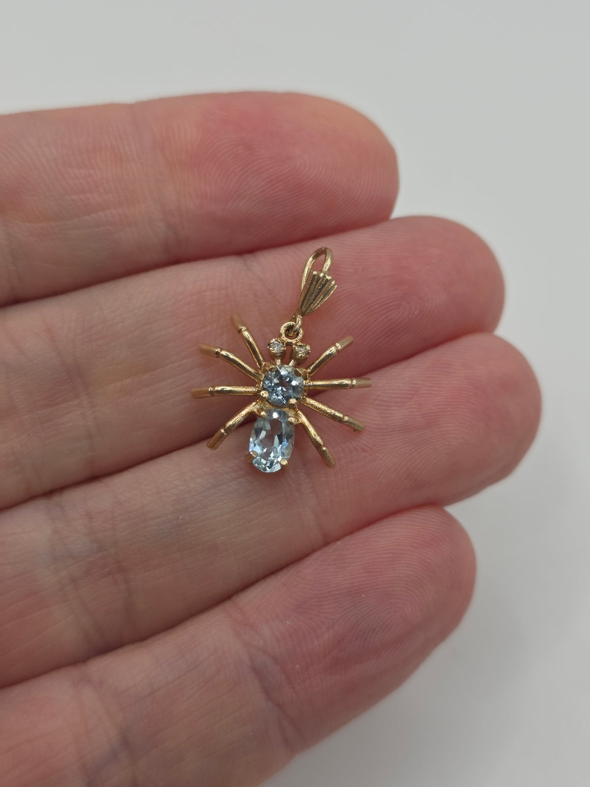 9ct gold topaz and diamond spider pendant