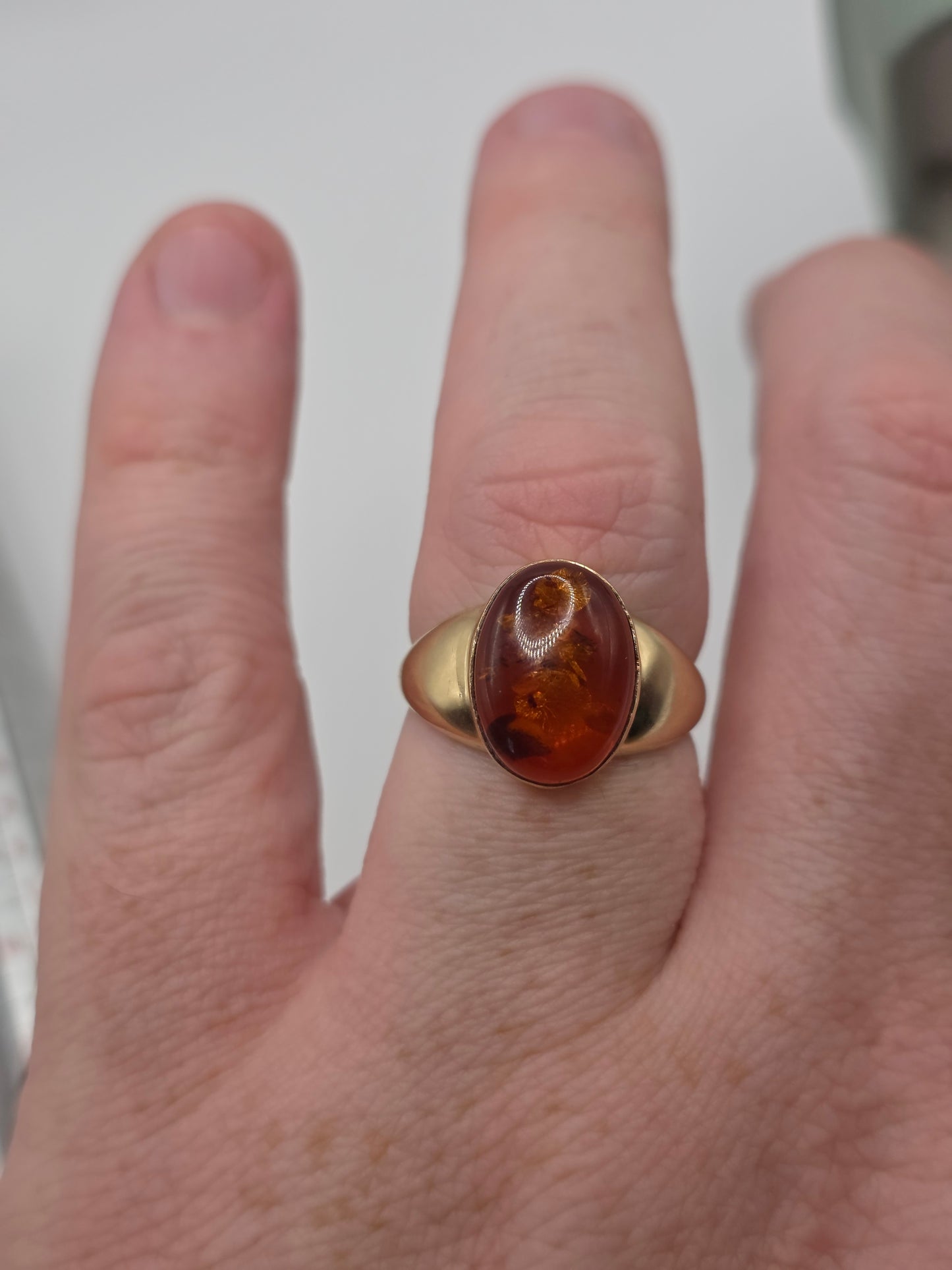 Heavy 9ct gold amber ring