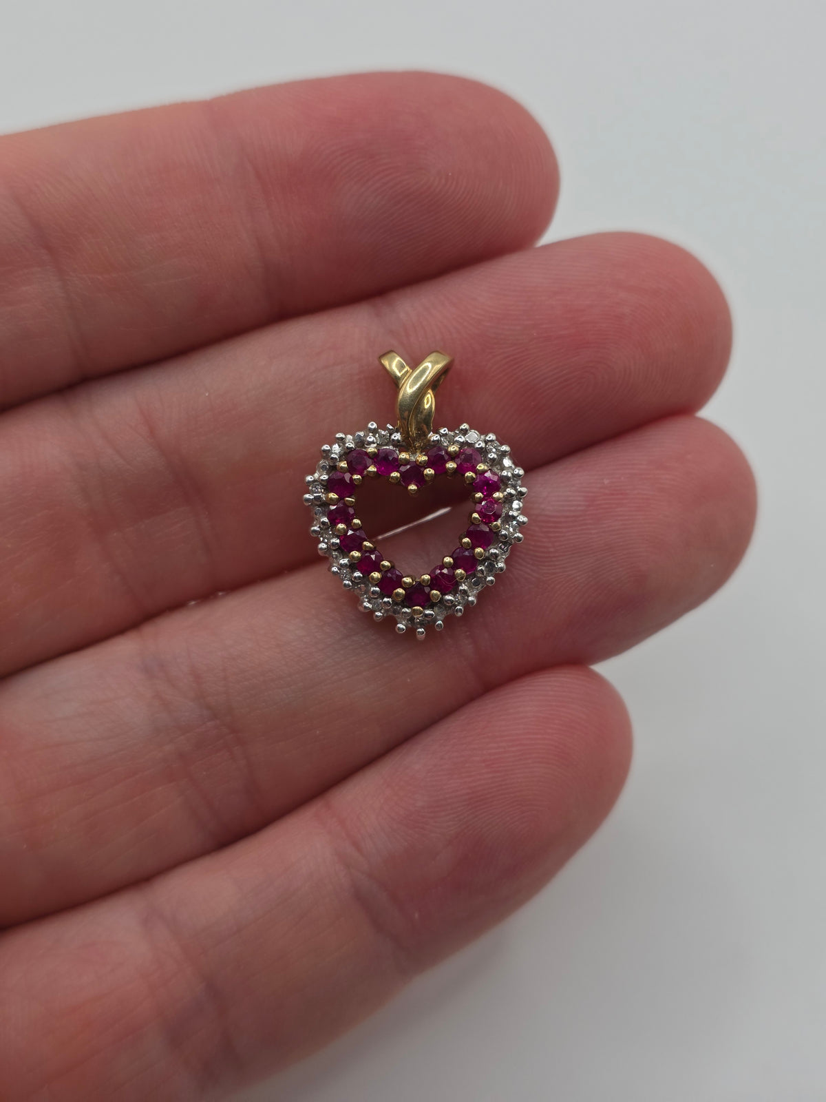 Heavy 9ct gold ruby and diamond heart pendant