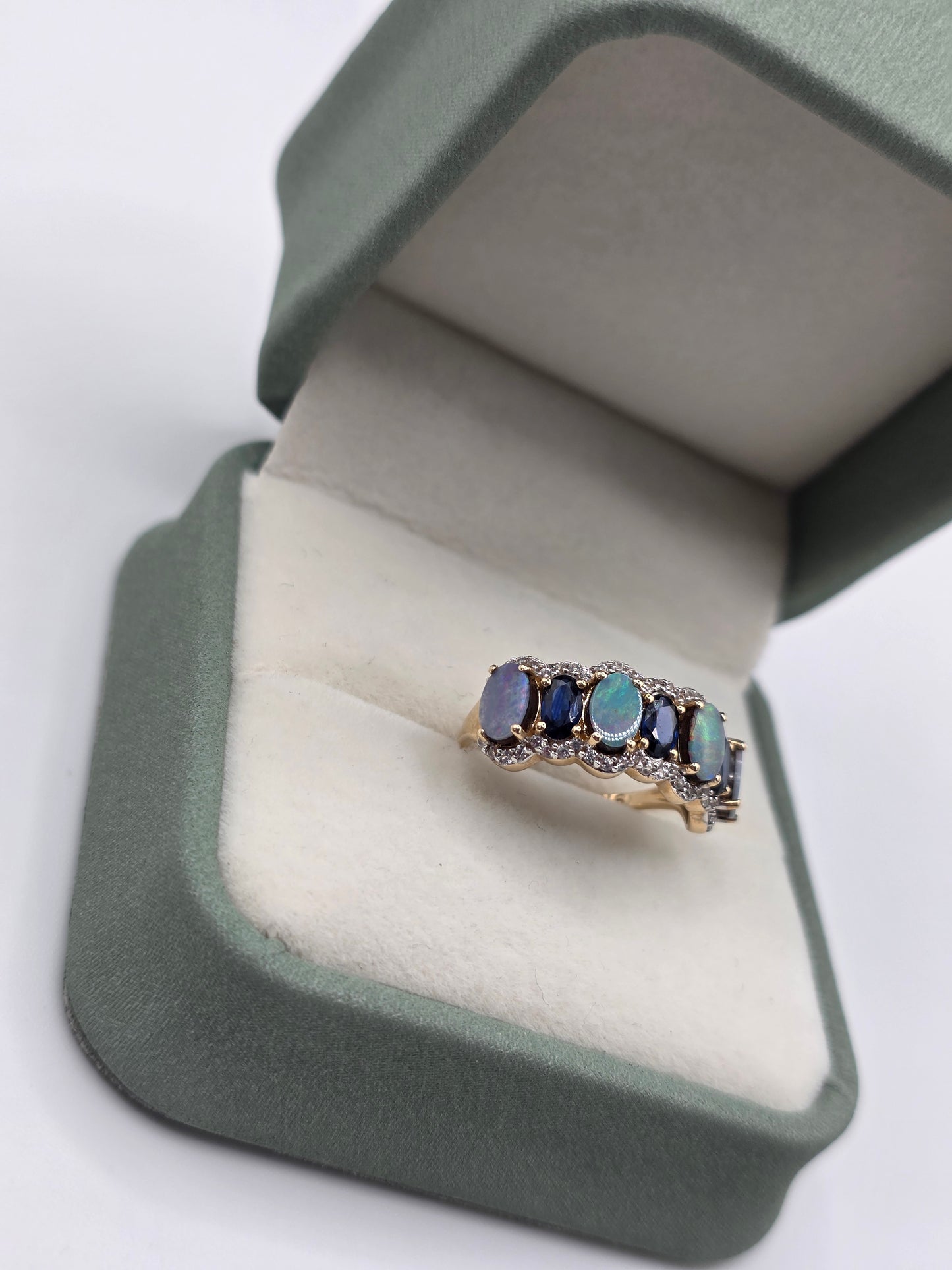9ct gold opal doublet, sapphire and zircon ring