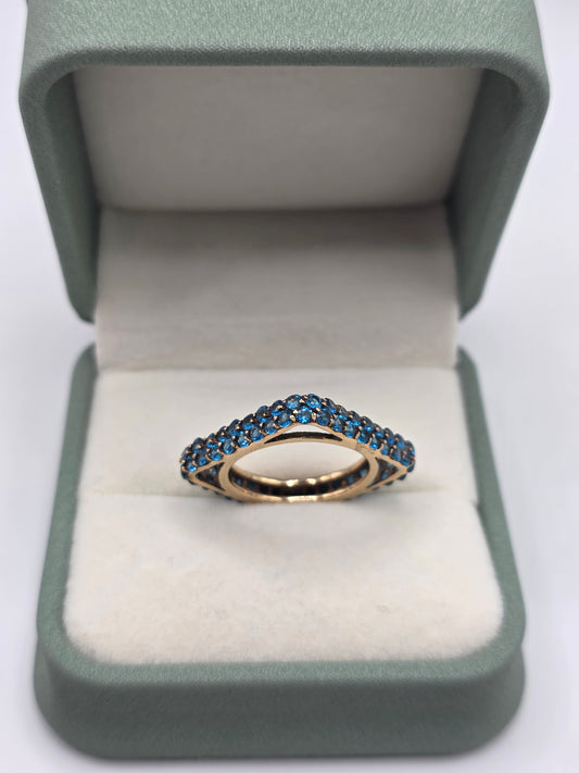 Unusual 9ct gold blue cz ring