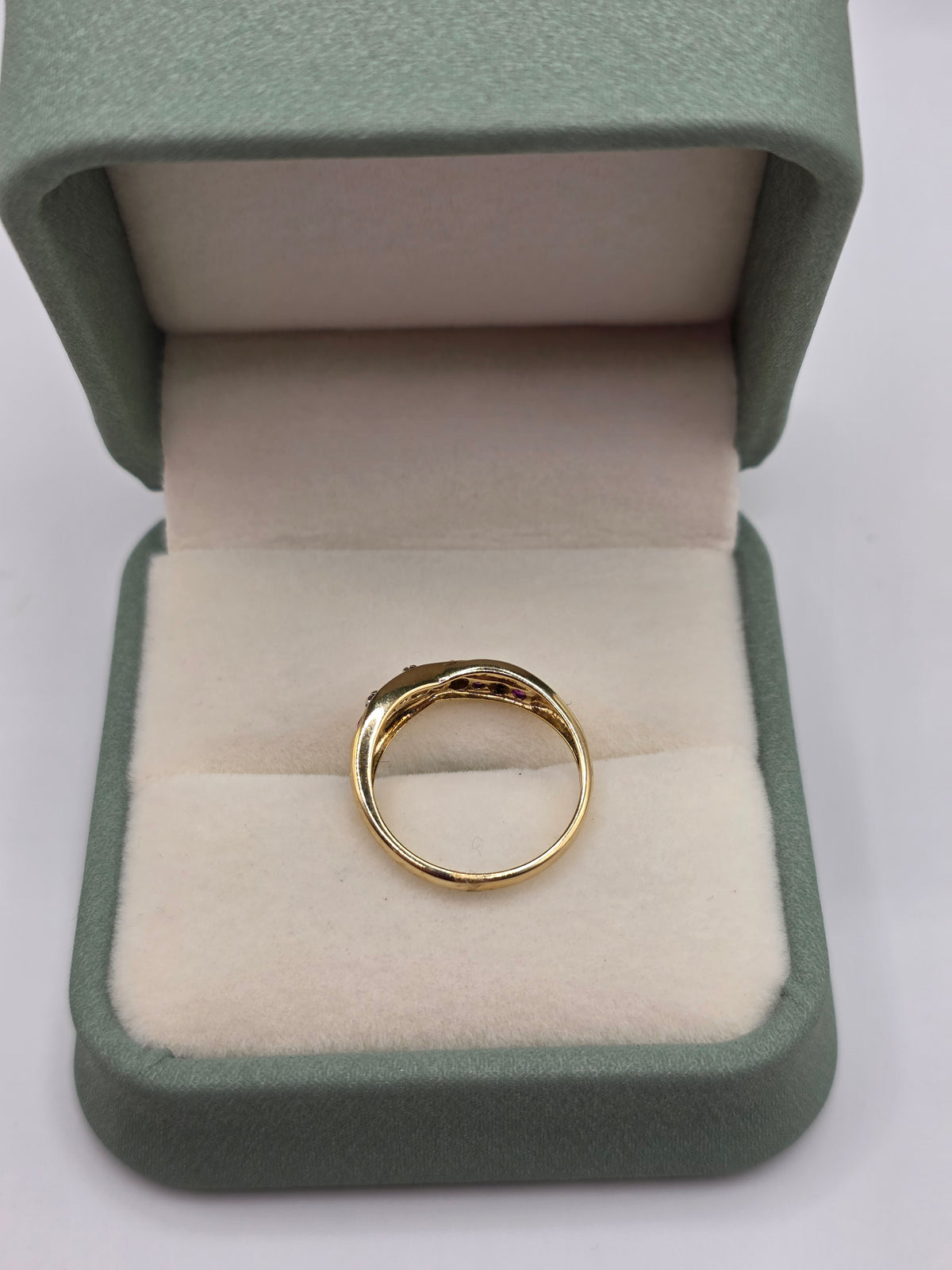 9ct gold ruby and diamond croos over ring – GrangeJewellers