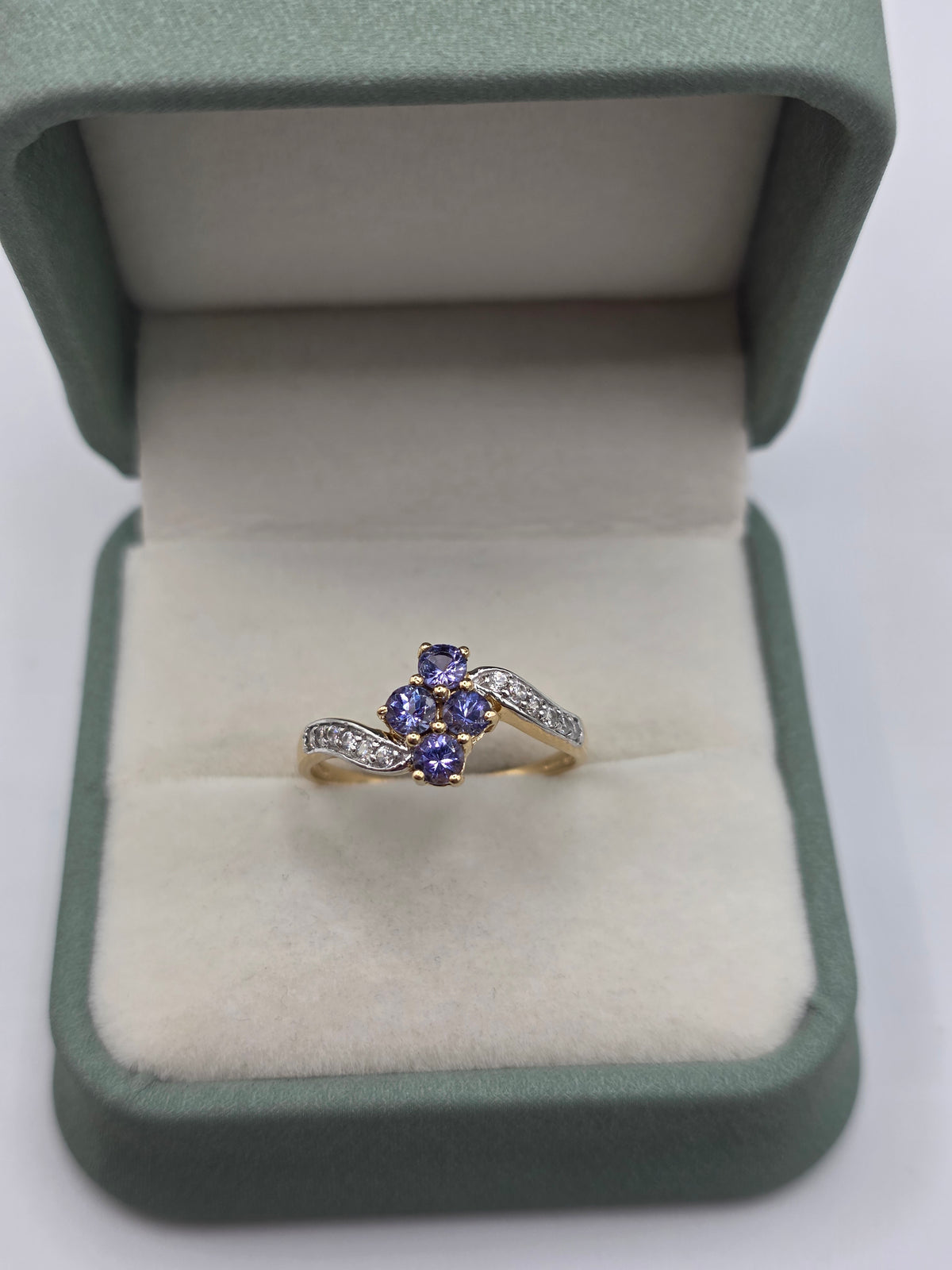 9ct gold tanzanite and white topaz ring