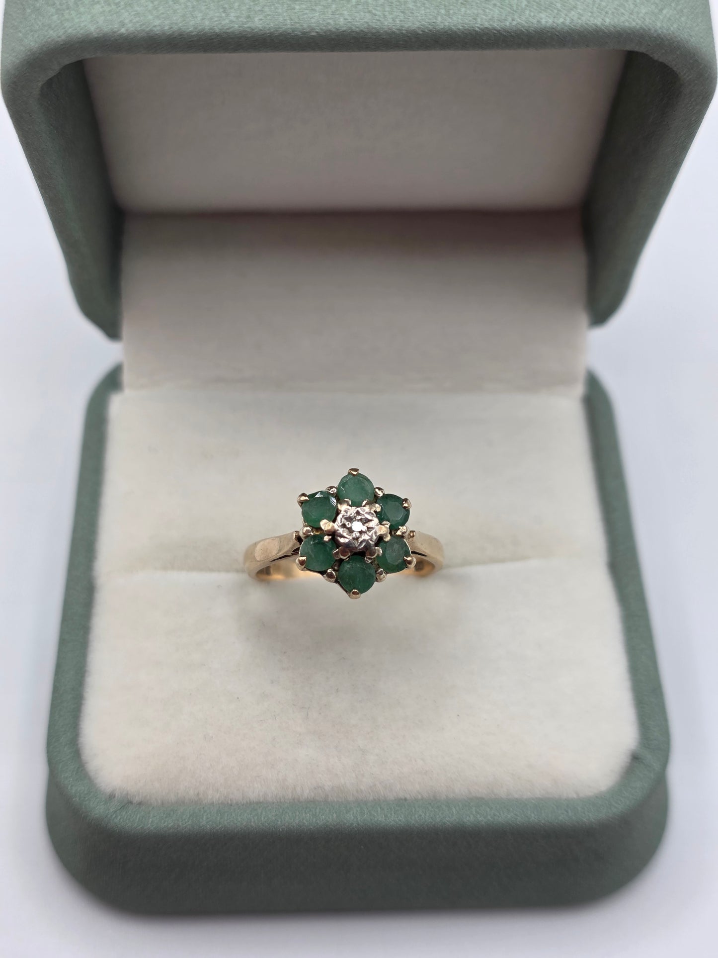 Heavy 9ct gold emerald and diamond ring