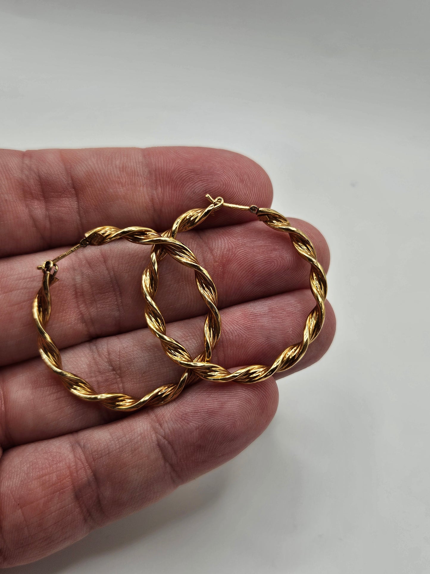 9ct rose gold twisted creoles