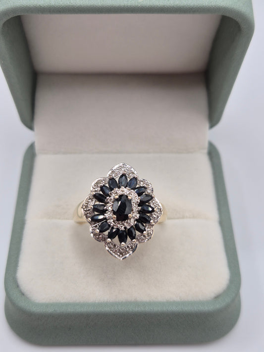 Heavy 9ct gold sapphire and diamond ring