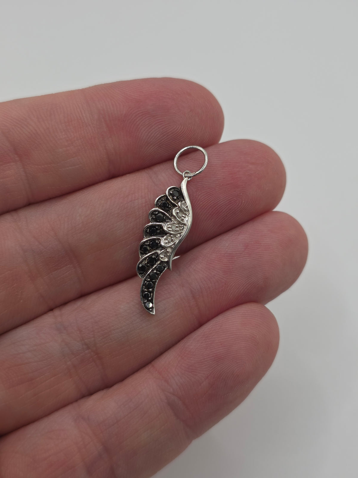 9ct white gold diamond wing pendant