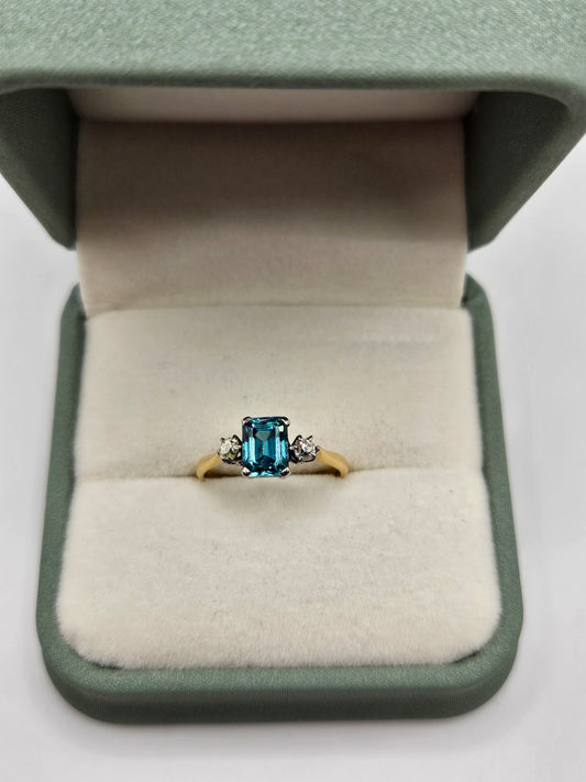 18ct gold blue zircon and diamond ring