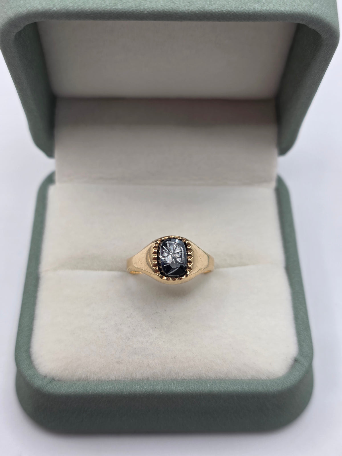 9ct gold hematite carved signet ring