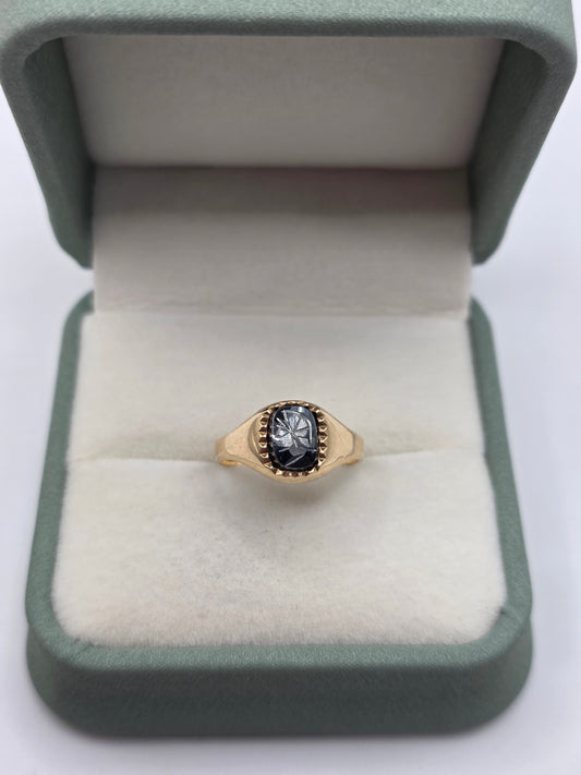 9ct gold hematite carved signet ring