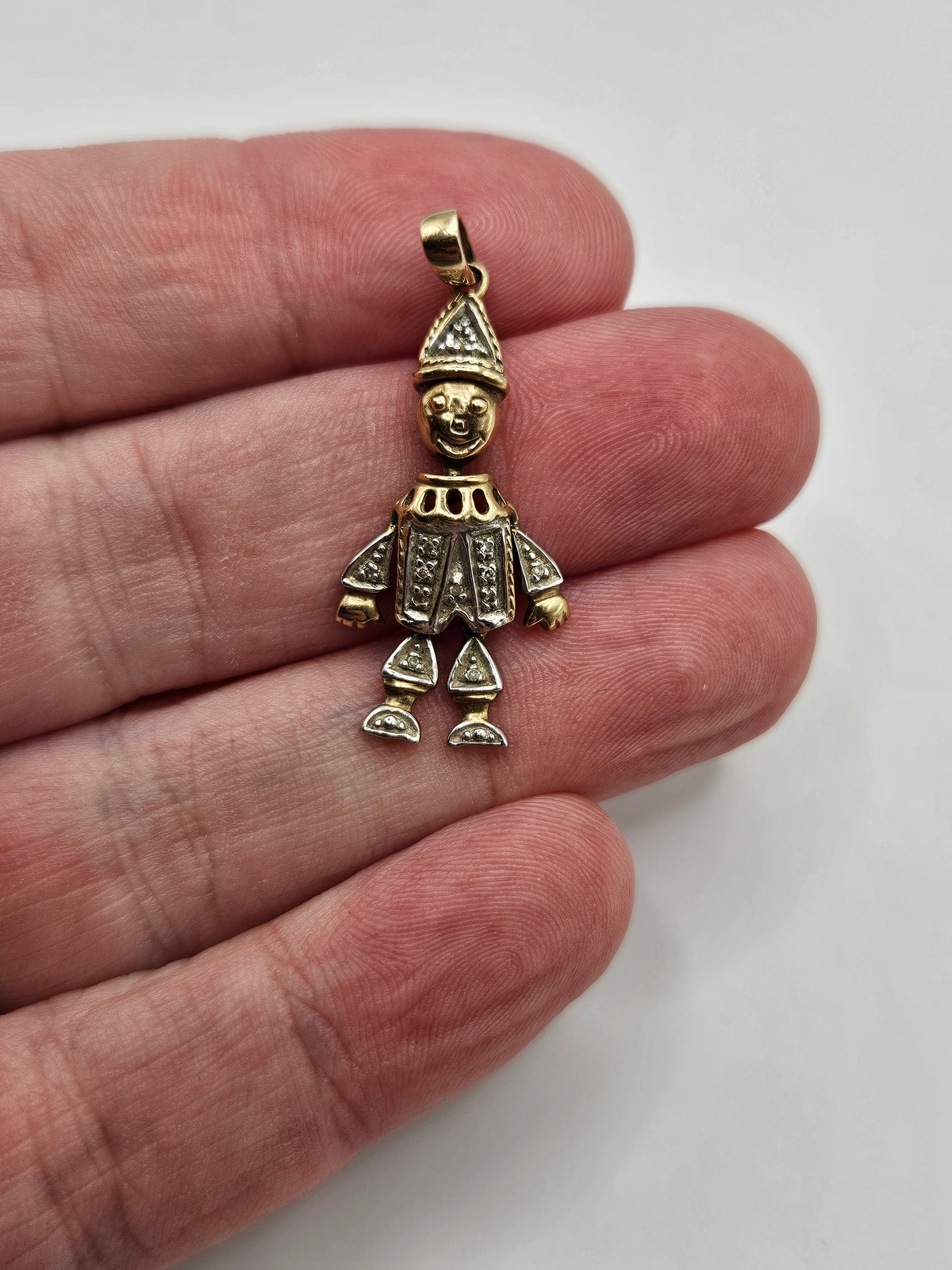 9ct gold diamond doll pendant