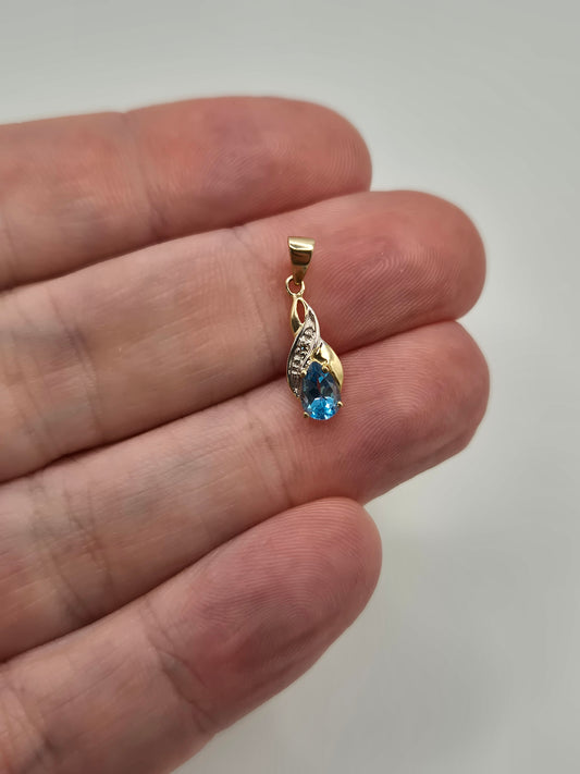 9ct gold topaz and diamond pendant