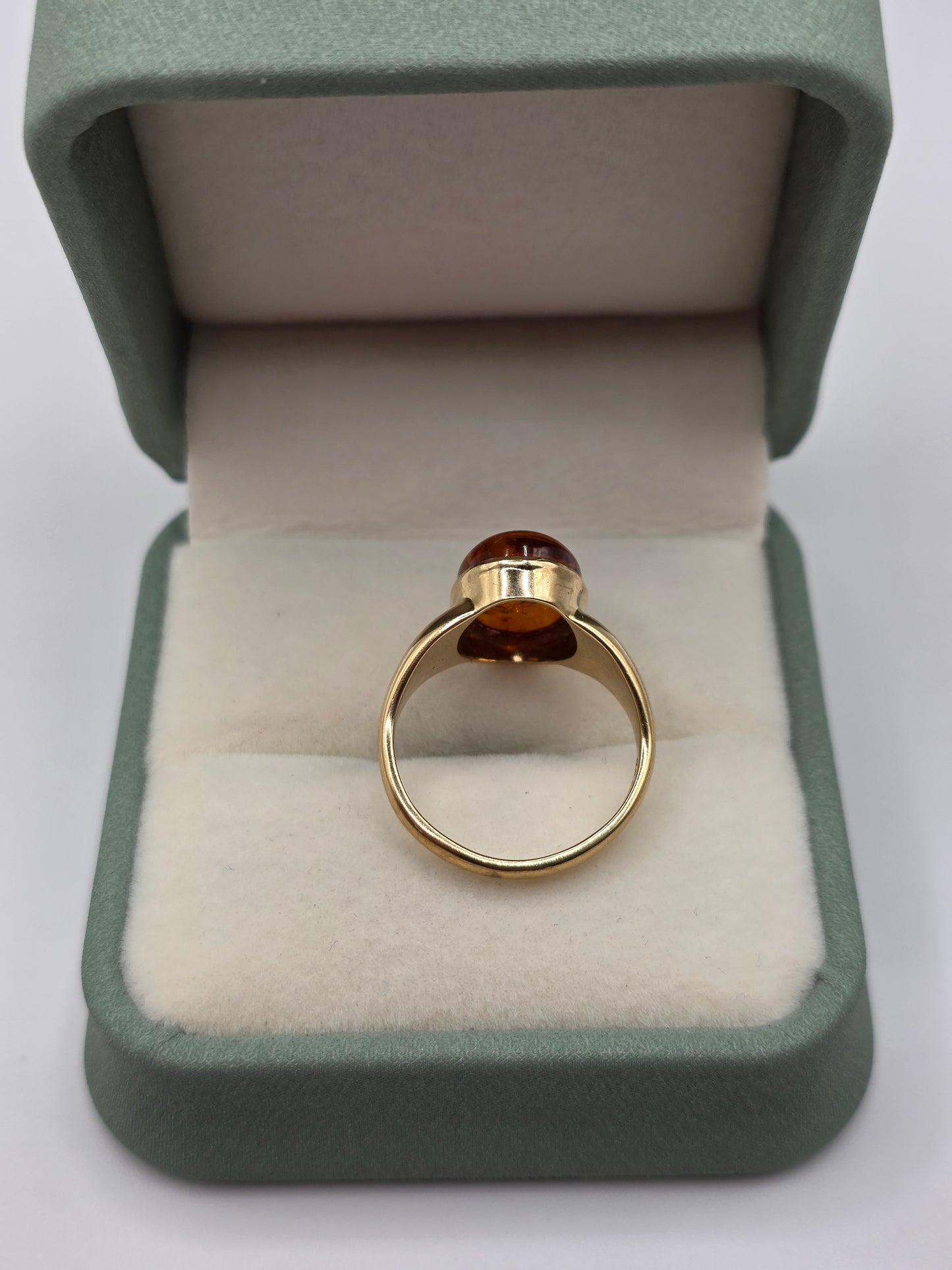 Heavy 9ct gold amber ring