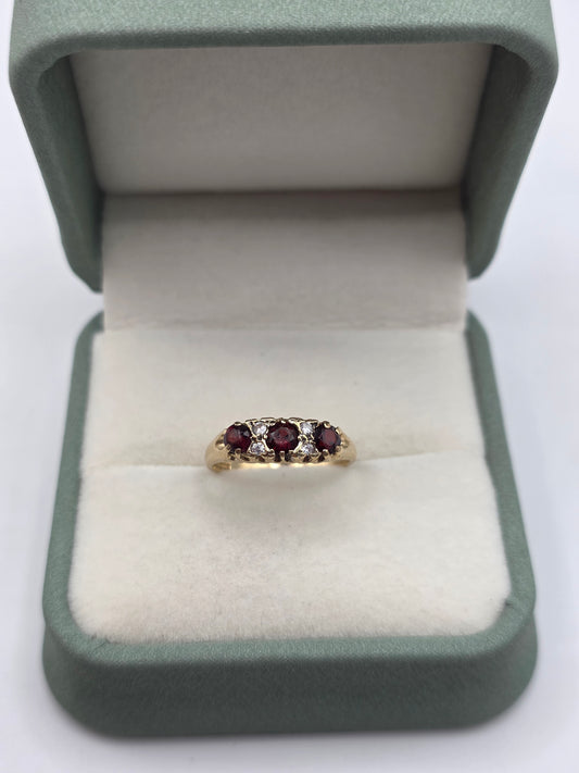 9ct gold garnet and cz ring