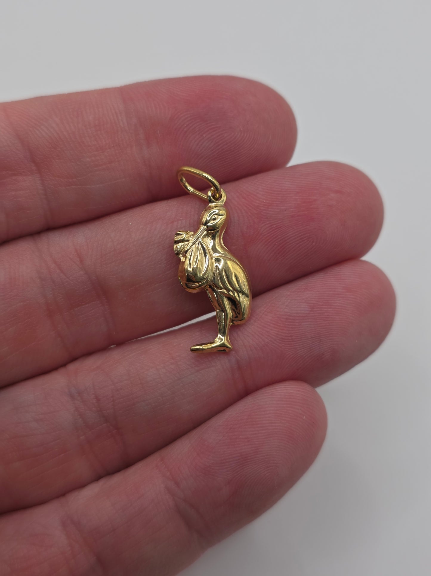 9ct gold stork and baby pendant
