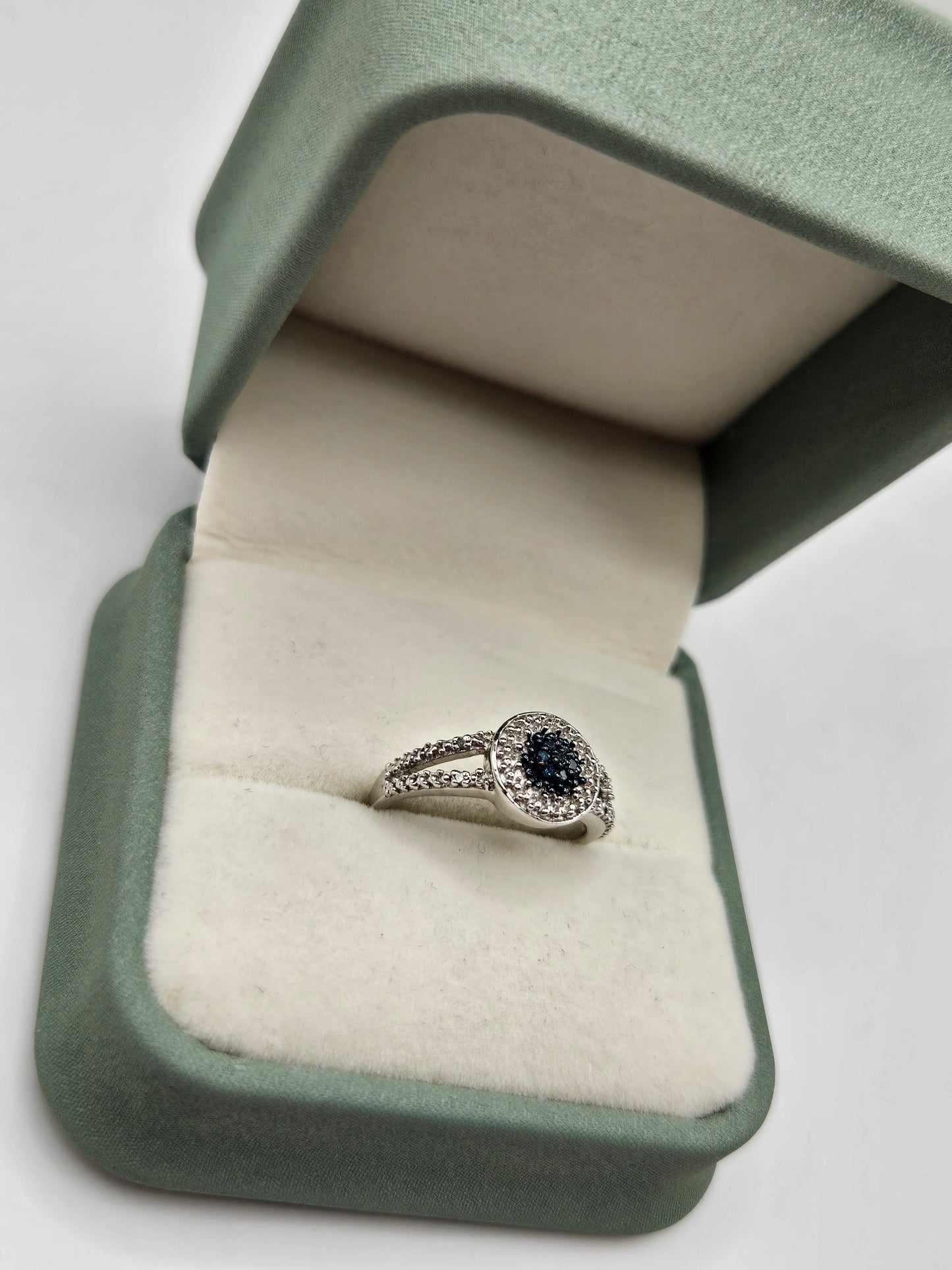 Silver blue and white diamond ring