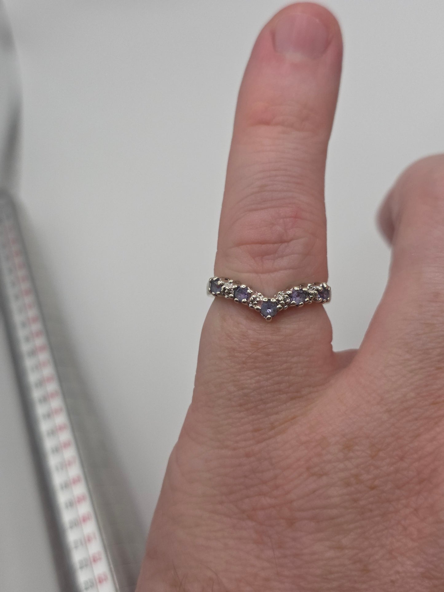 9ct gold tanzanite and diamond wishbone ring