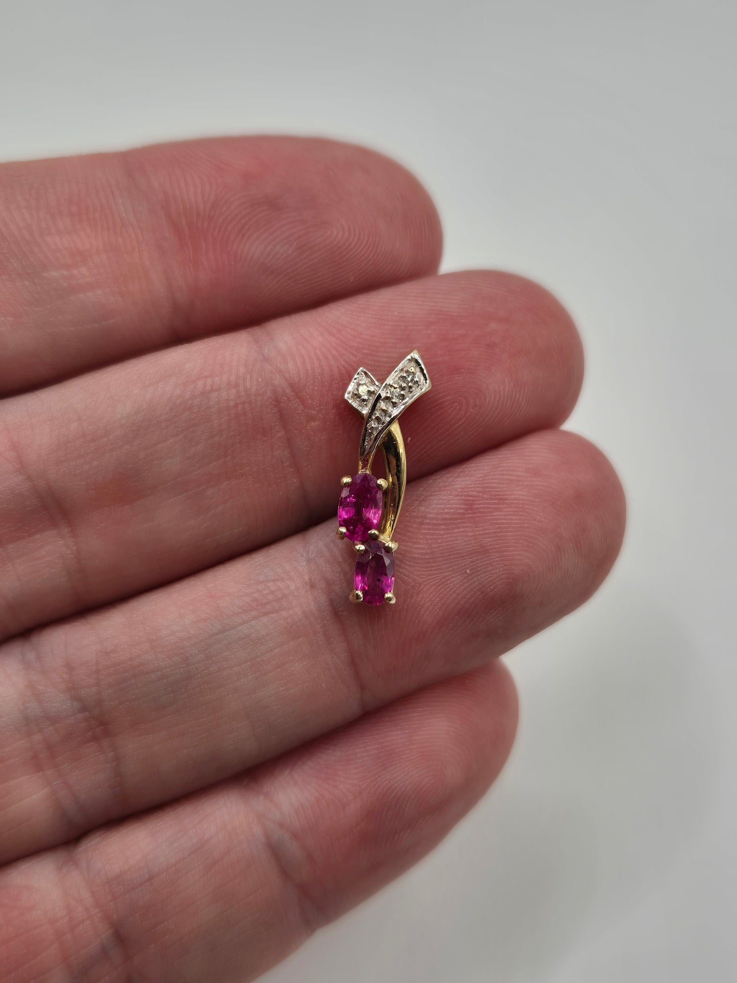 9ct gold pink topaz and diamond pendant