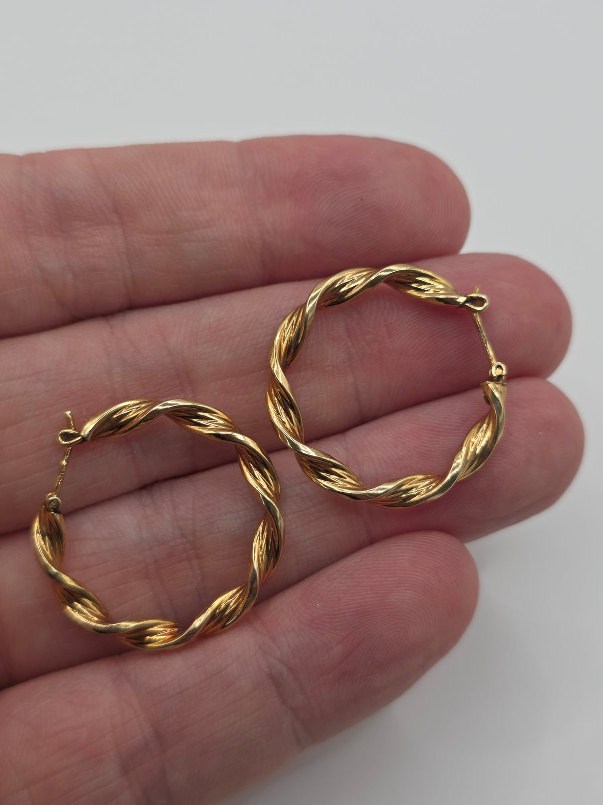9ct gold twisted creole earrings