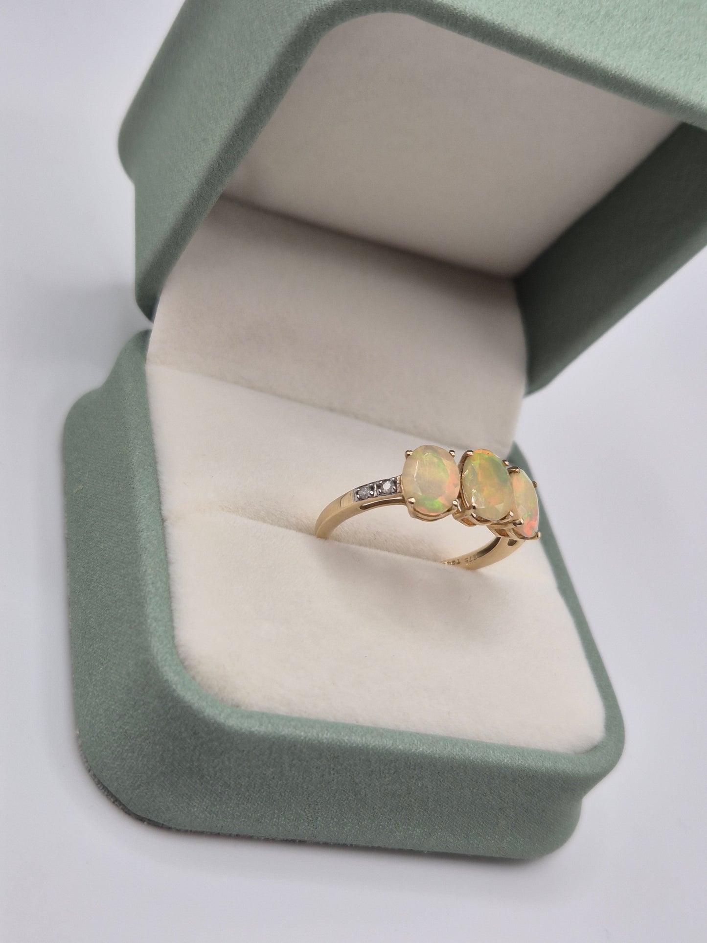 9ct gold 2.1 carat opal and diamond ring