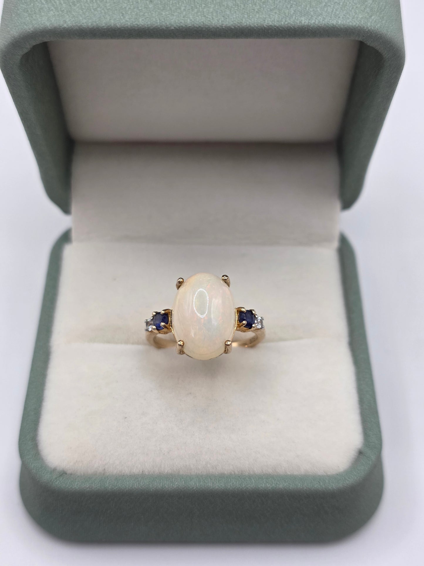 9ct gold opal, sapphire and white spinel ring
