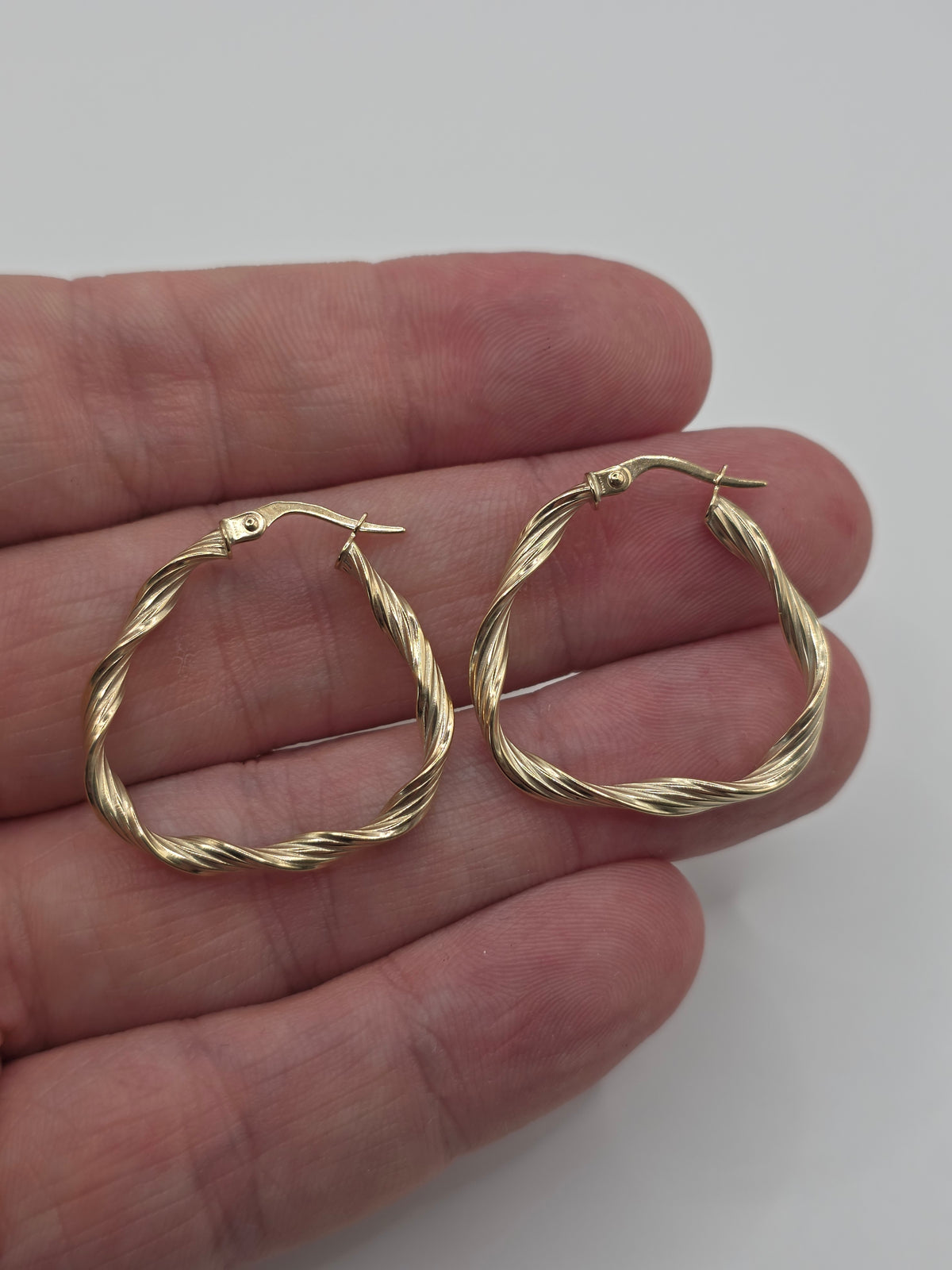 9ct gold twisted creole earrings