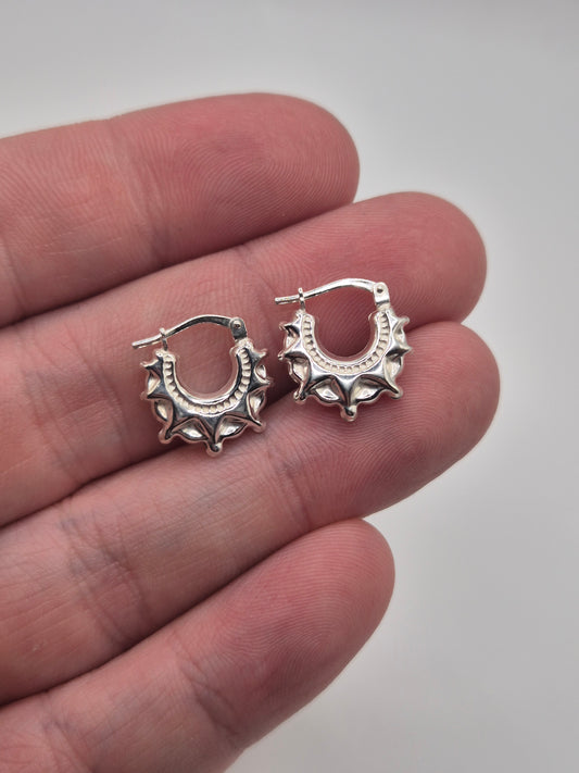 Silver creole spike earrings