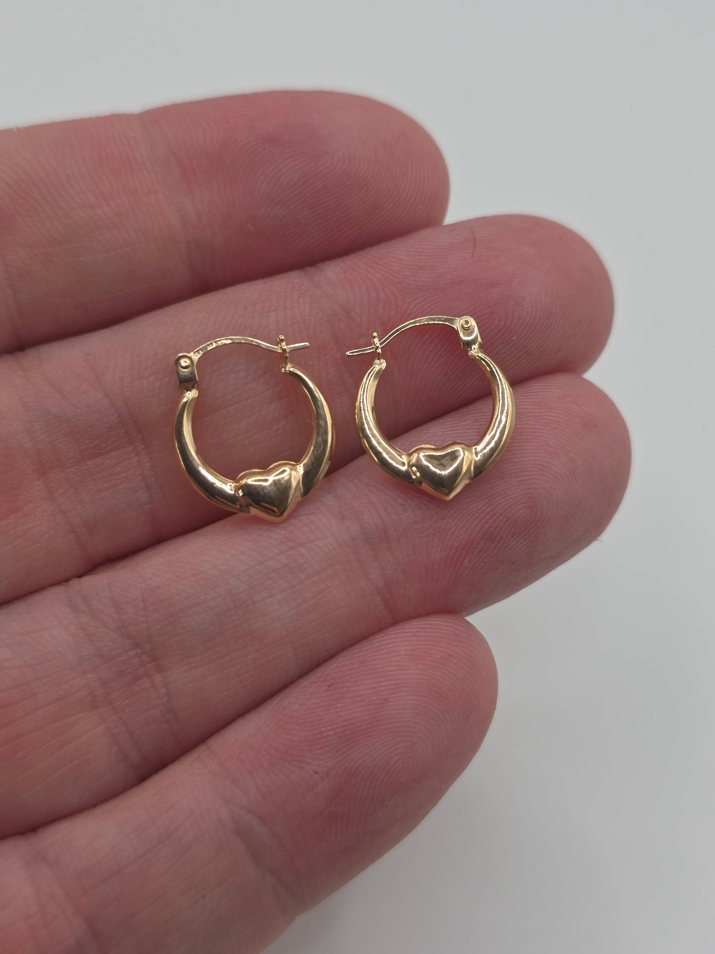 9ct gold claddagh creole earrings