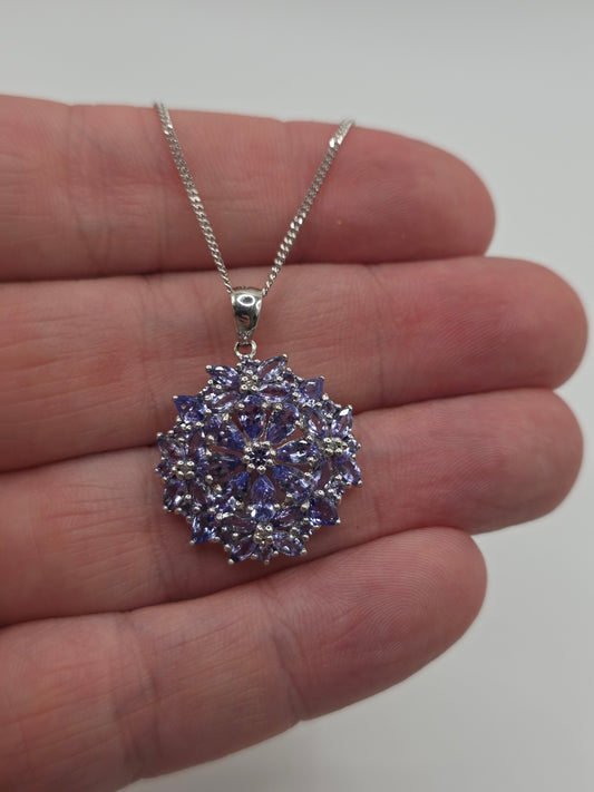 Heavy 9ct white gold tanzanite cluster necklace