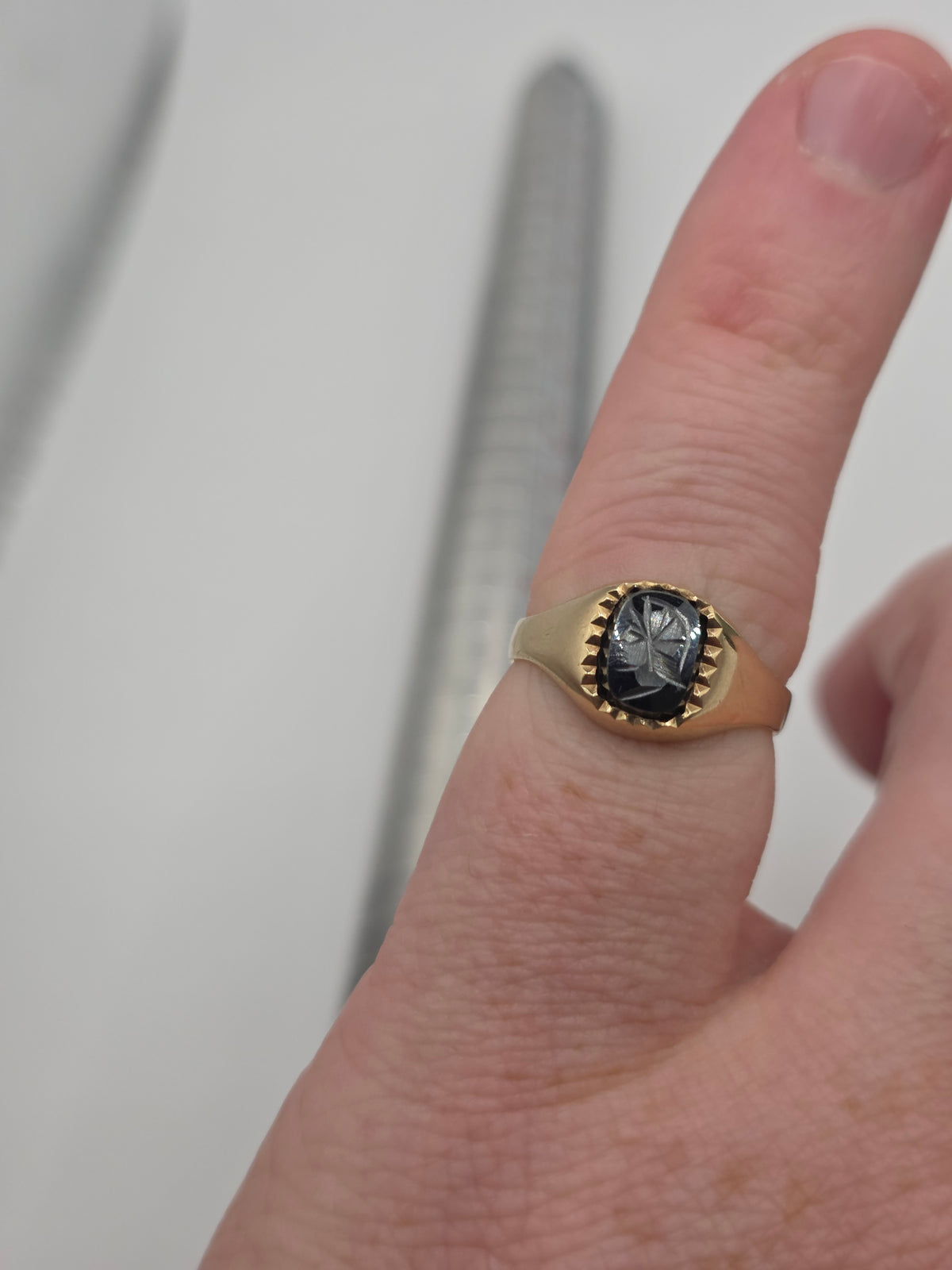 9ct gold hematite carved signet ring