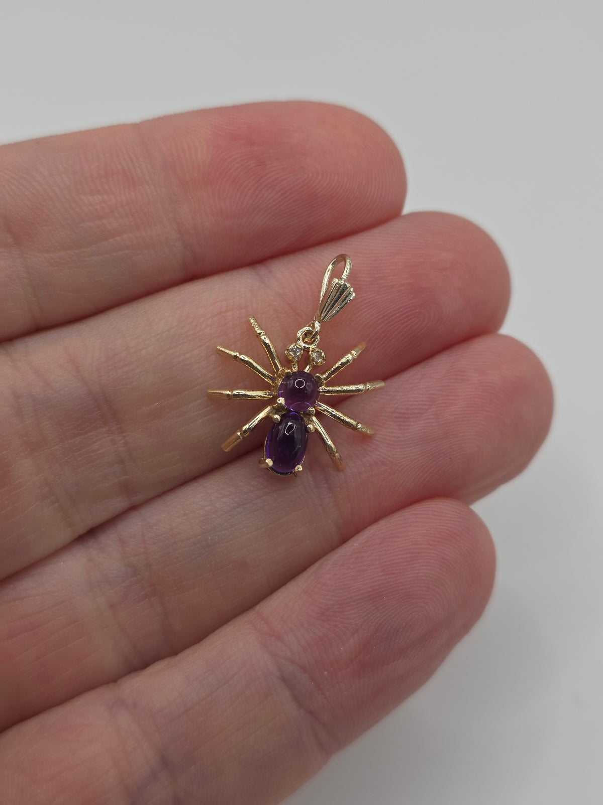 9ct gold cabachon amethyst and diamond spider pendant