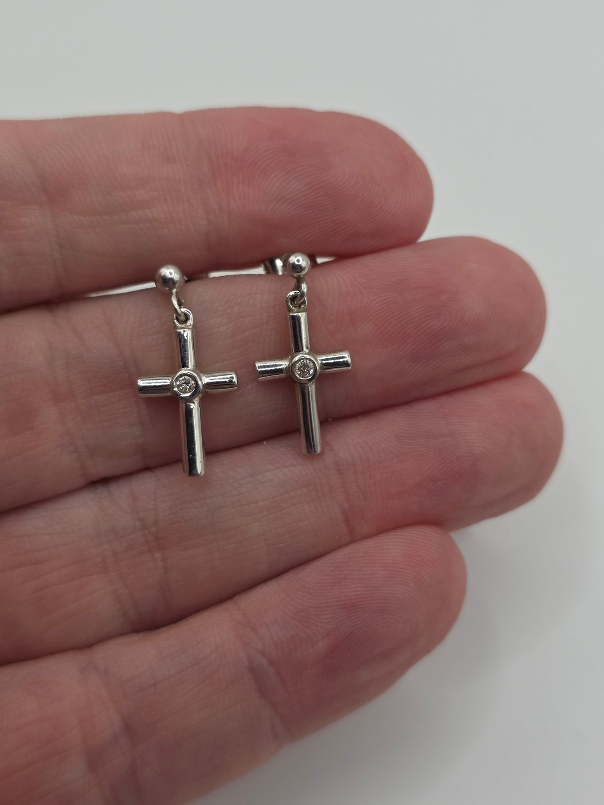 Heavy 9ct white gold diamond cross earrings