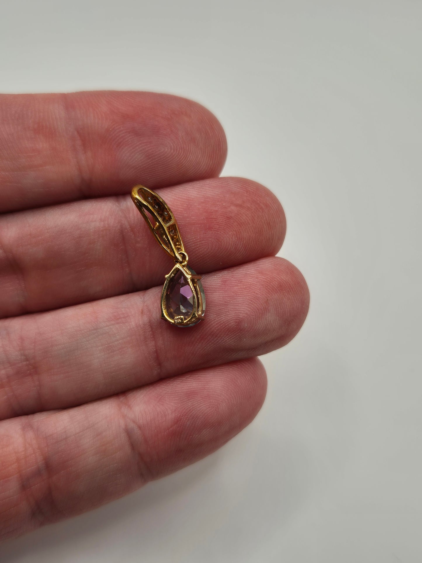 9ct gold mystic topaz and diamond pendant