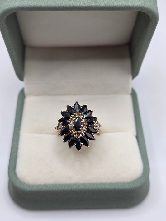 Heavy 9ct gold sapphire and diamond ring