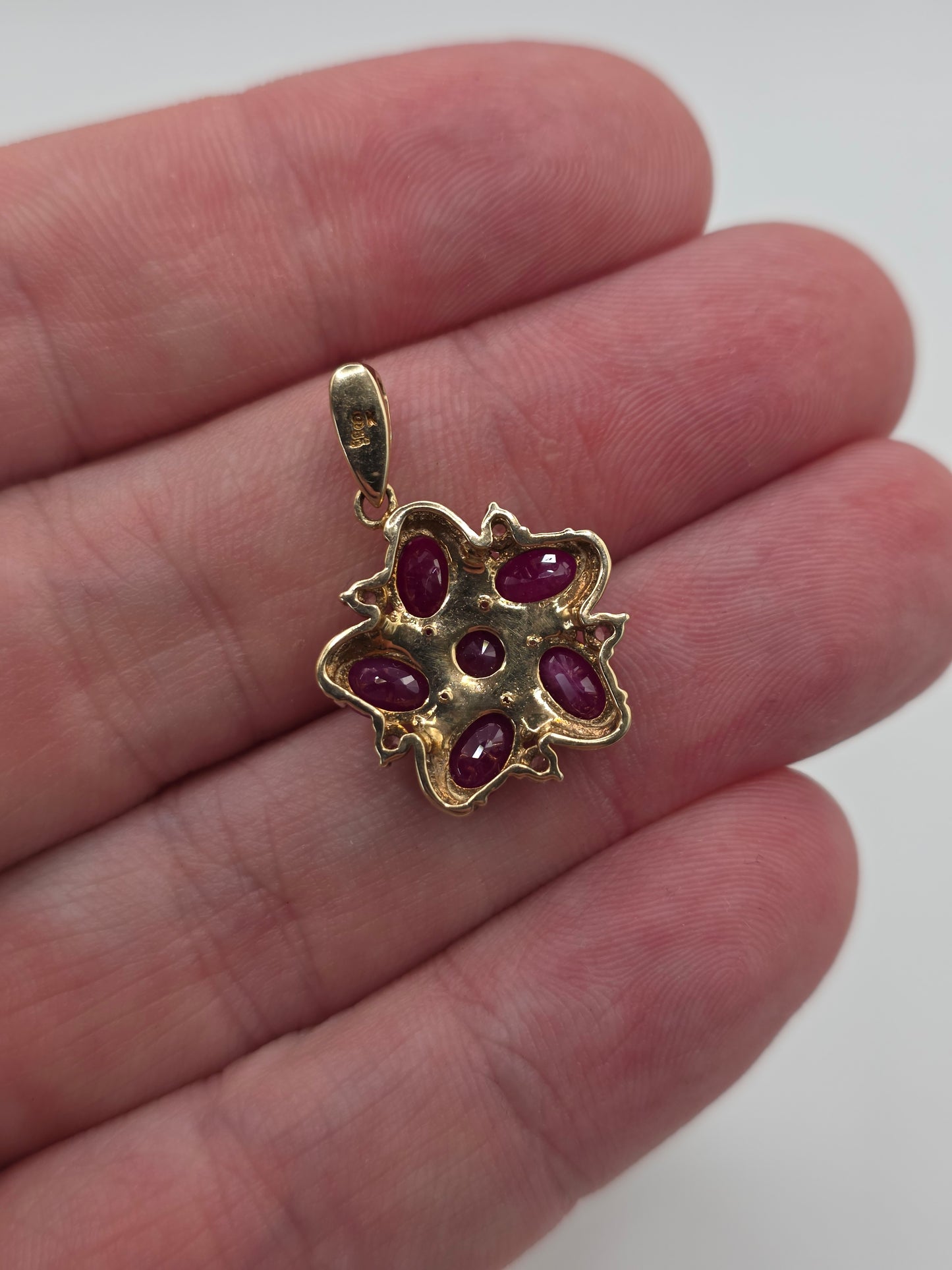 9ct gold ruby and zircon pendant