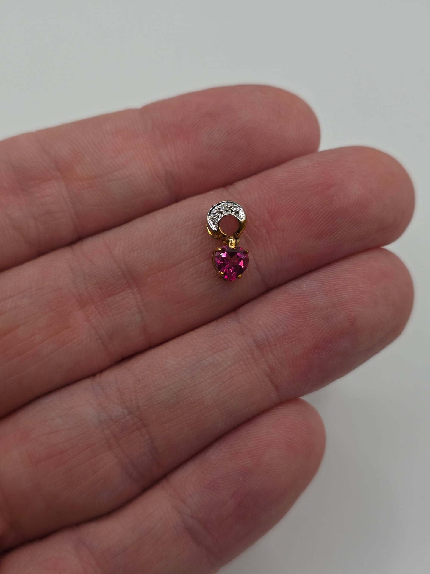 9ct gold pink topaz and diamond pendant