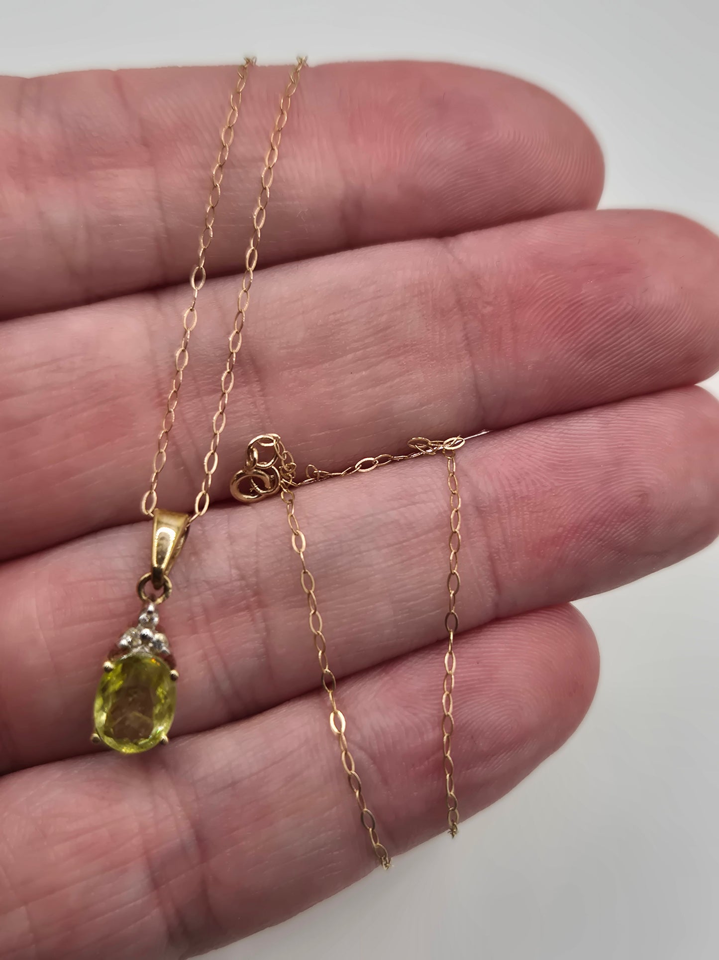 9ct gold sphene and white zircon necklace
