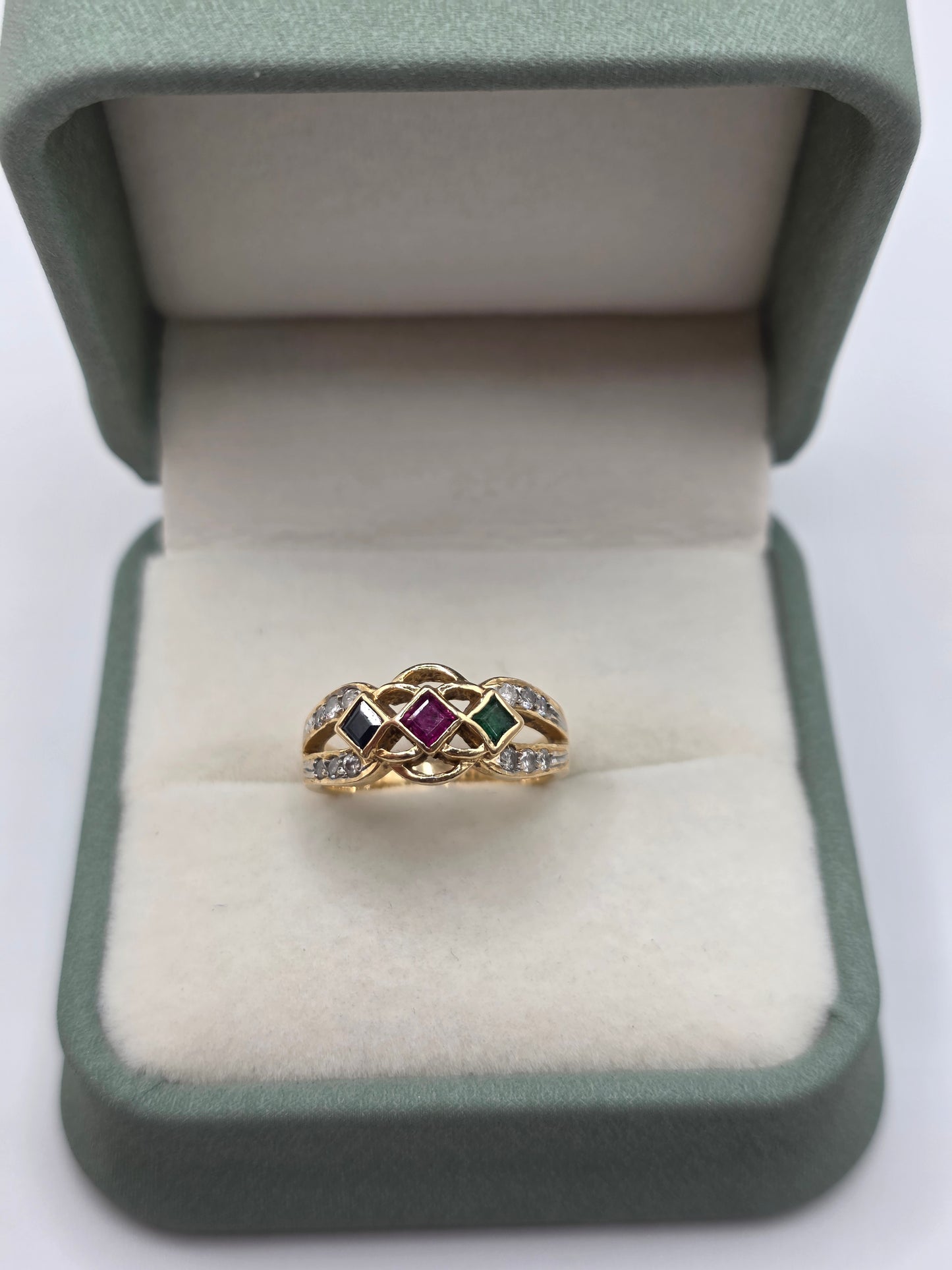 Heavy 14ct gold emerald, sapphire, ruby and diamond ring