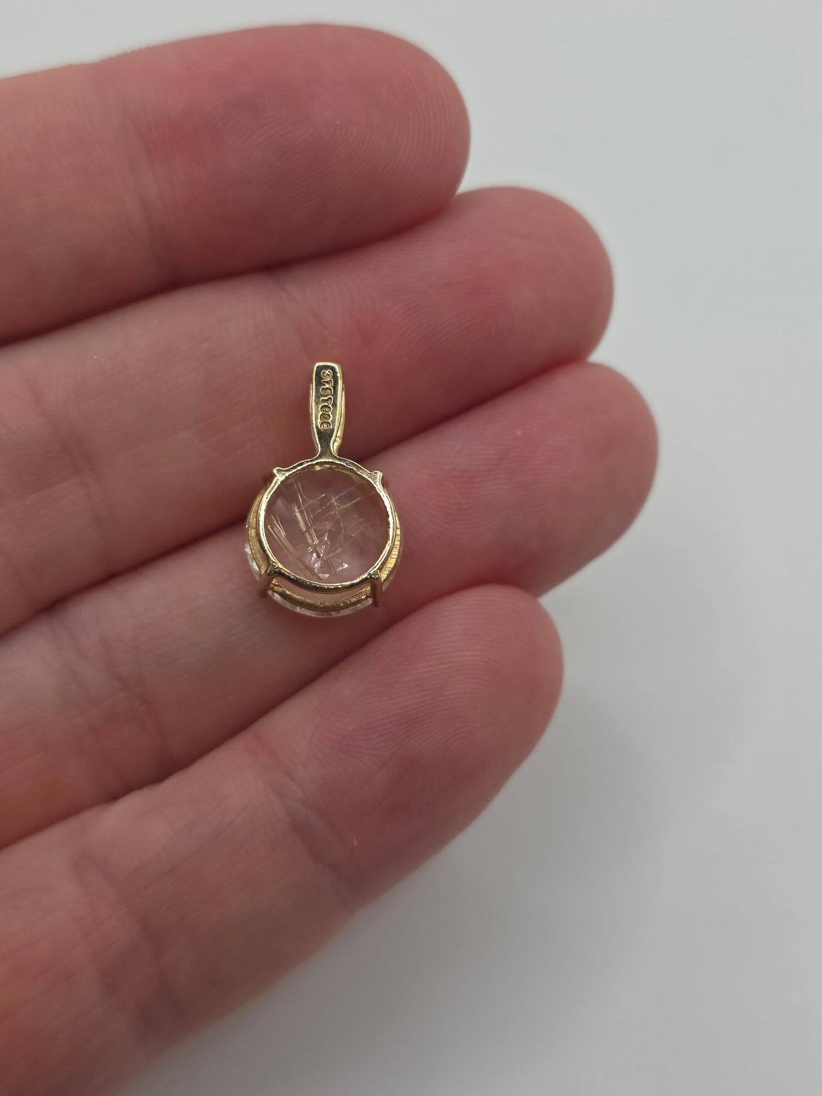9ct gold rutile quartz and topaz pendant